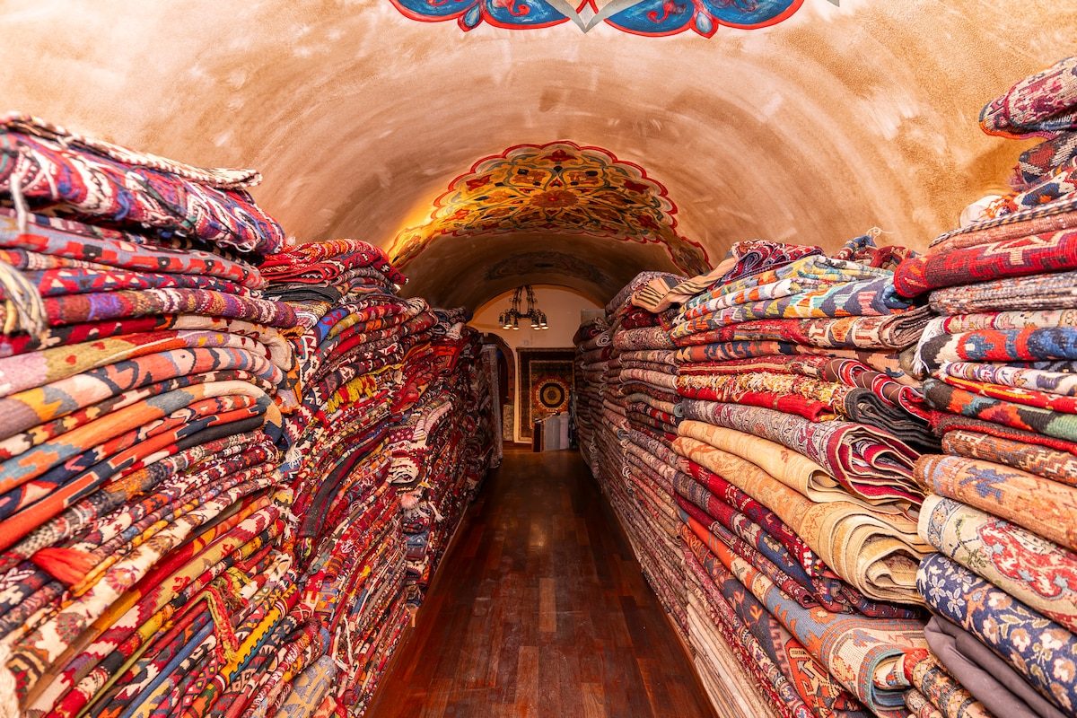 Carpets stacked inside the caravanserai
